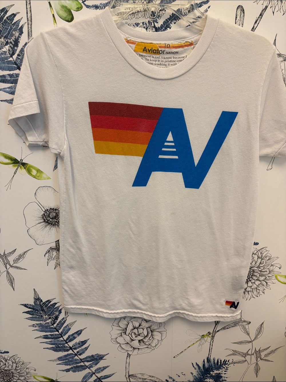 Kids - Aviator Nation White Tee with Blue AV Logo and Red-Orange-Yellow Stripe
